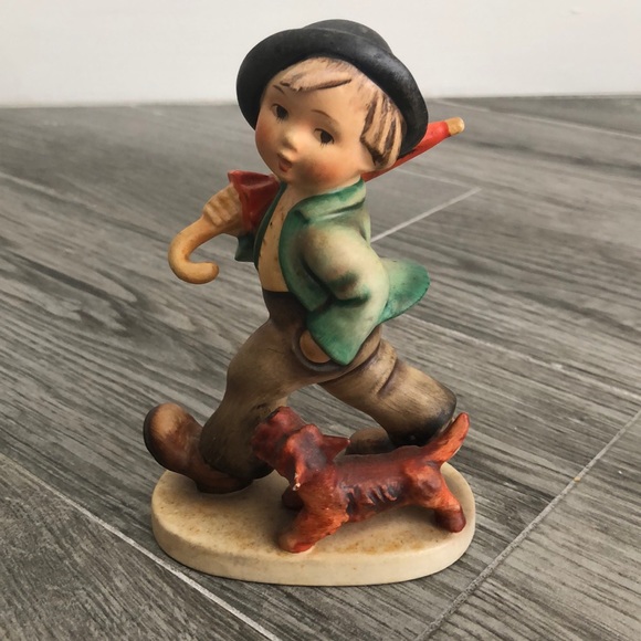 hummel boy with umbrella